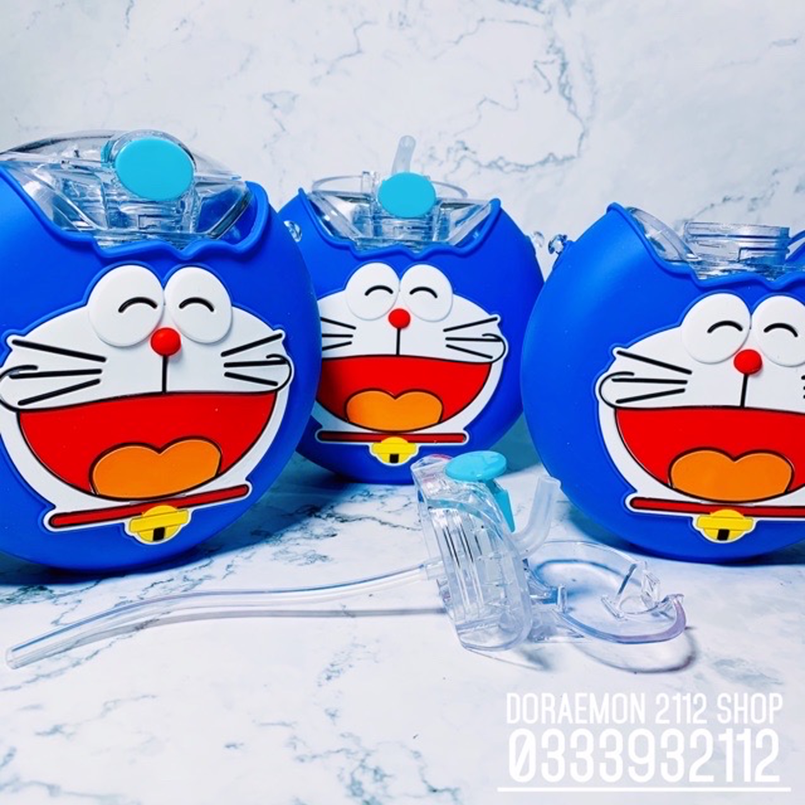 Bình nước doraemon donuts
