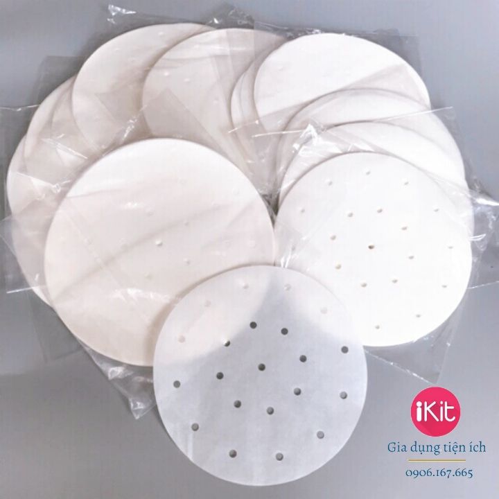 Set 100 tờ Giấy nến lót nồi chiên không dầu, giấy đục lỗ lót nướng bánh, Size to 22cm. Loại giấy xịn chịu được nhiệt độ cao, giấy dai không bị bở, bục khi nhúng vào nước