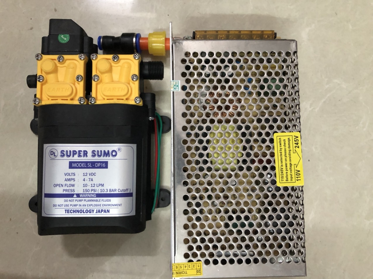 Bơm đôi SUMO tăng gấp đôi áp lực Lưu lượng nước 10-12L/phút Nguồn tổ ong 12V 10A Tặng chuyển ống ra phun sương Sử dụng làm bộ rửa xe, phun sương tưới cây...