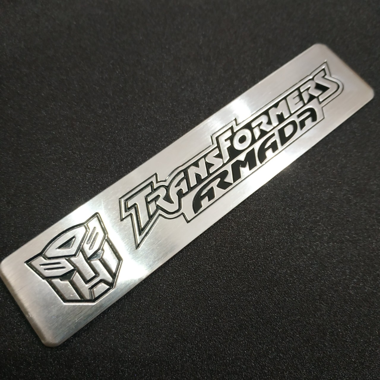 Tem nhôm dán xe TransFormer trắng dài 12x2.6cm