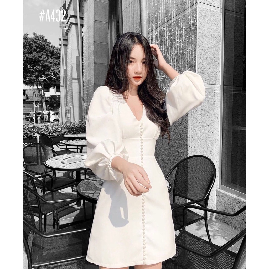 Đầm trắng tay phồng dạo phố phối nút giữa xinh xắn