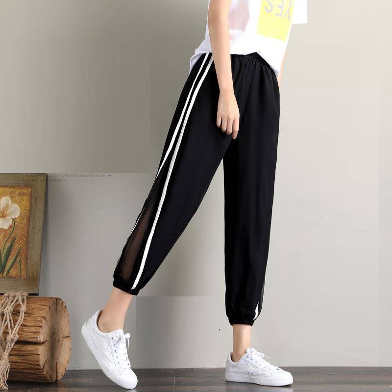 Quần jogger vải đũi xước phối lưới sọc sườn thời trang phong cách cho nữ