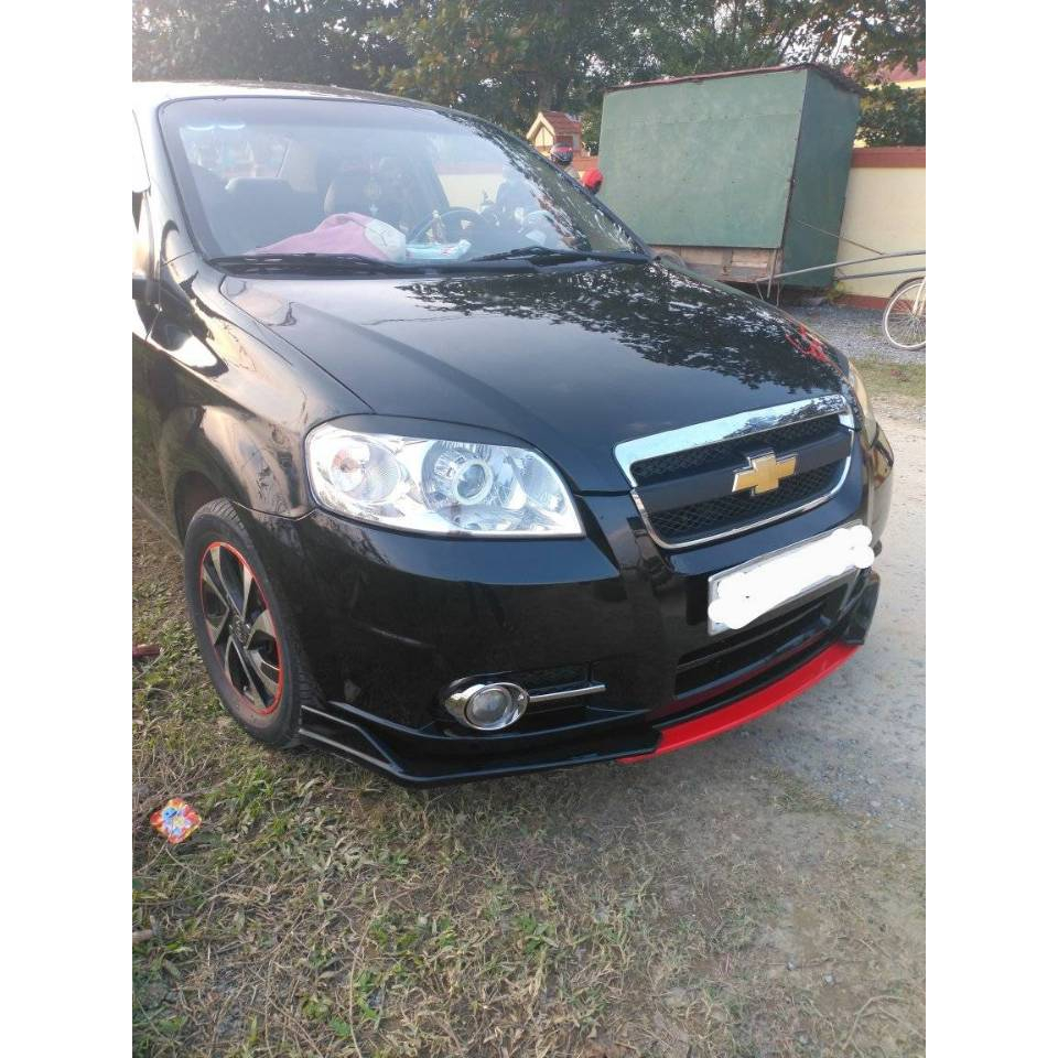 Lip po trước xe gentra - aveo