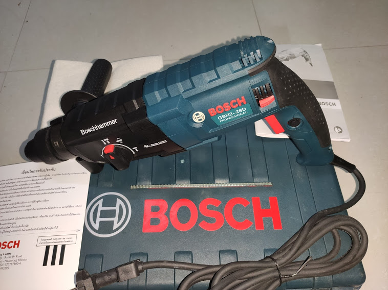 Máy khoan bê tông Bosh GBH2-28D, 1200W, đủ 3 chức năng khoan gỗ sắt, bê tông và đục bê tông, xuất xứ BOSH Thái Lan  (loại có một măng danh)