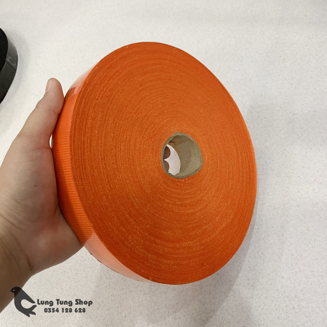 Cuộn dây vải may viền cắt sẵn màu cam ( cuộn 100 mét )