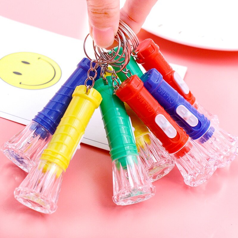 Móc khóa gắn đèn pin mini dễ thương màu sắc ngẫu nhiên