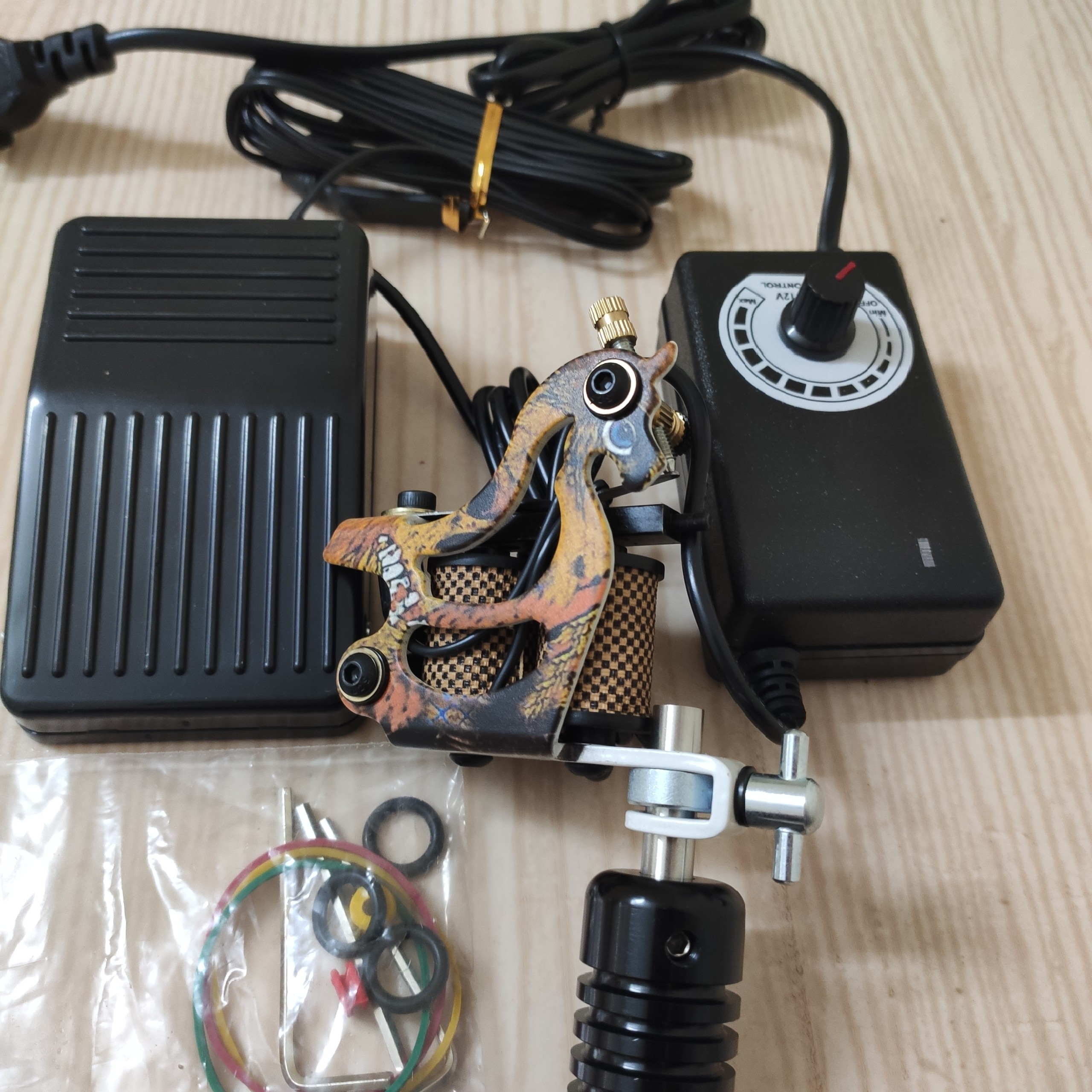 Combo máy xăm học viên + biến áp + bàn đạp + dây móc