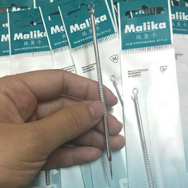 Que nặn mụn malika