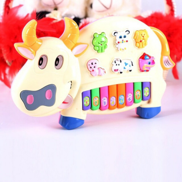 ĐỒ CHƠI TRẺ EM ĐÀN HÌNH CHÚ BÒ
