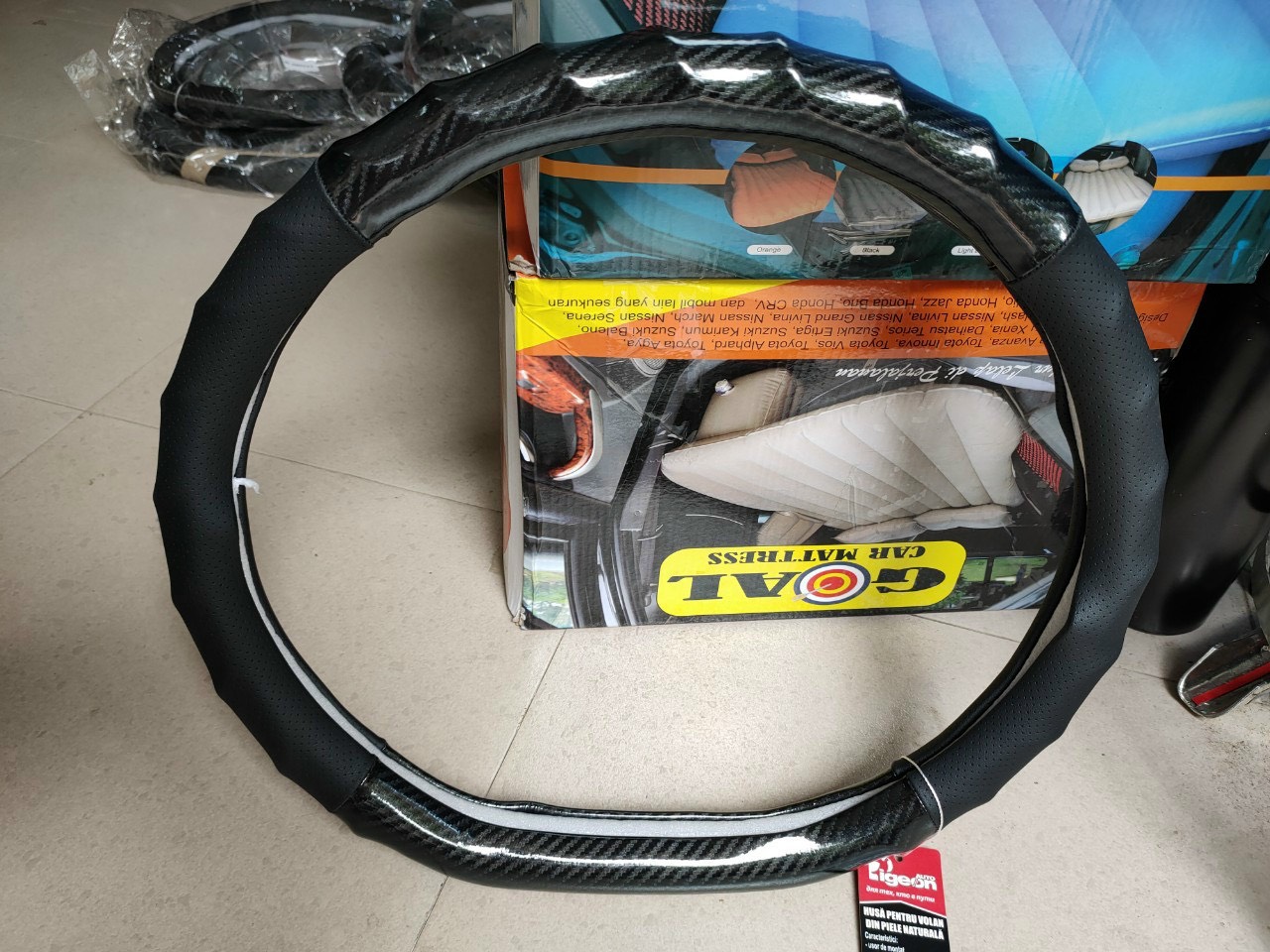 Bọc vô lăng carbon chữ D cho xe elantra, kia , Seltos, Suzuki XL7 ( có gân Trơn xoắn)