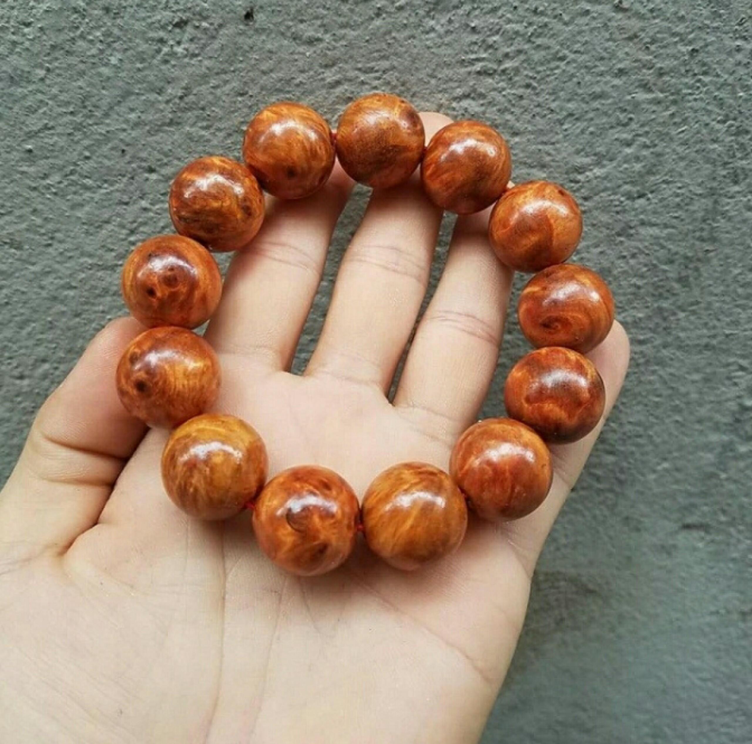 Vòng tay gỗ nu huyết long 18ly
