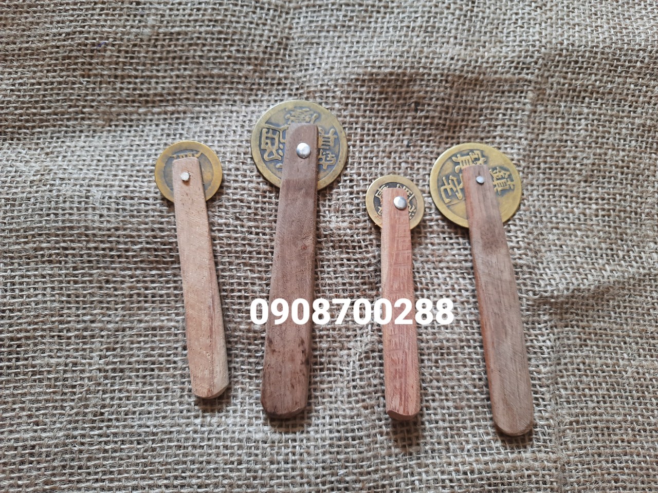 Đồng tiềƞ cạo gió có tay cầm cán gỗ