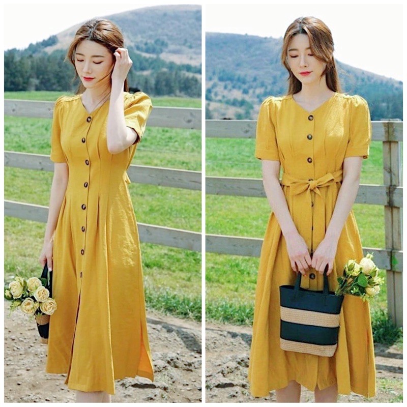 Đầm vàng nút nâu thắt eo