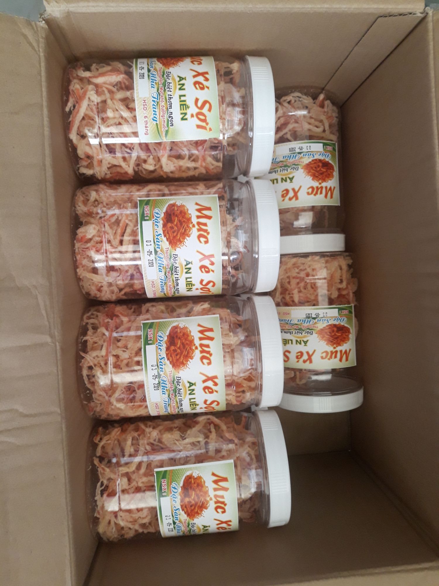 Mực xé hấp nước dừa hủ 150g .
