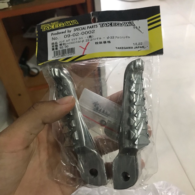Gác chân nhôm trusty gắn mọi loại xe