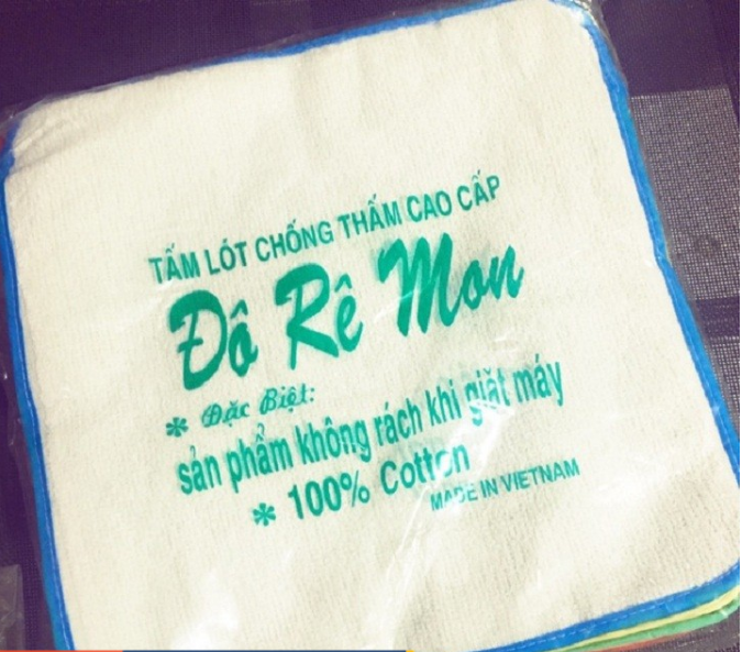 Tấm lót chống thấm doremon 30*35cm - tấm lót sơ sinh