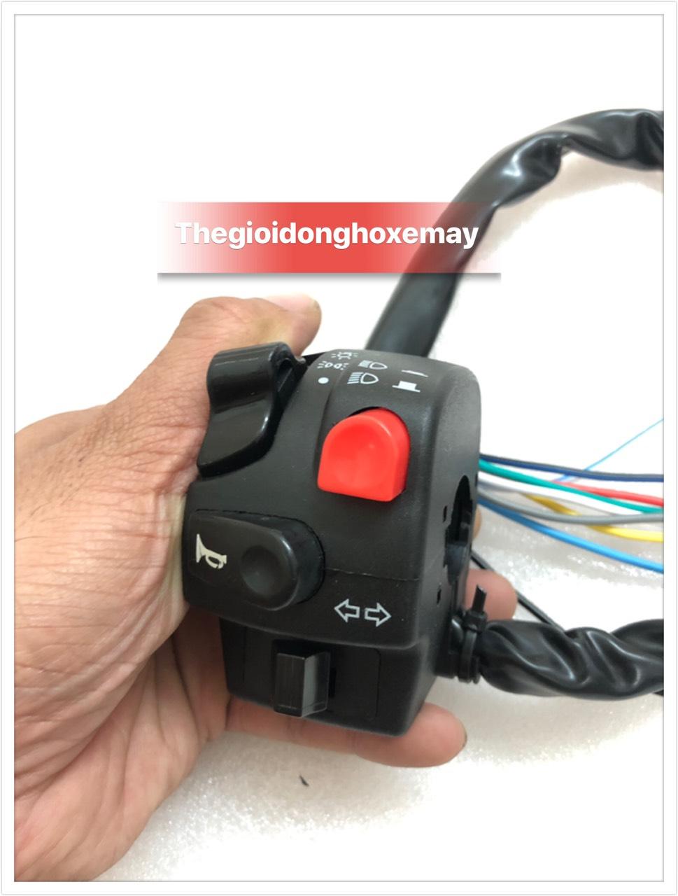 cùm công tắc domino nút đỏ bên trái lớn