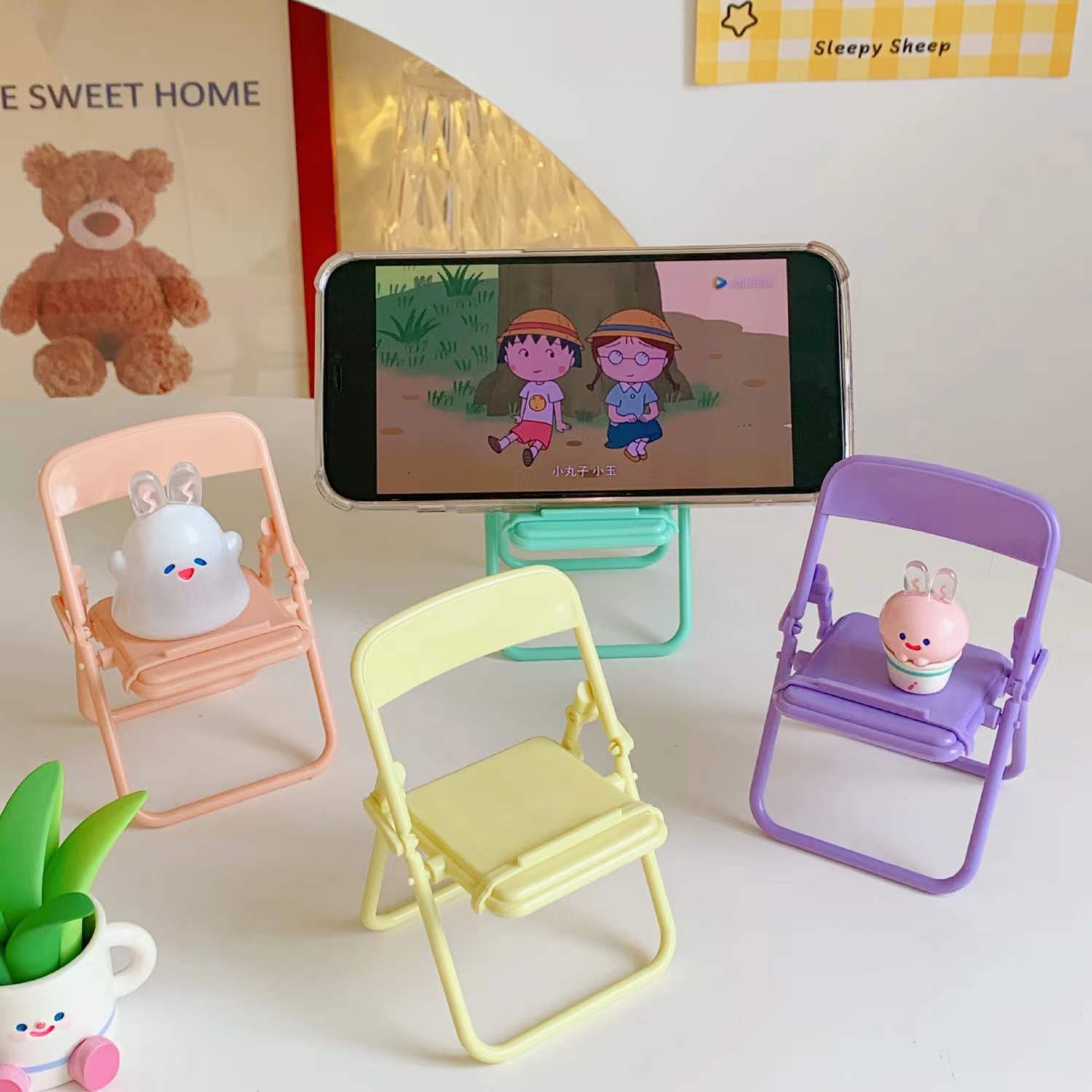 Giá đỡ điện thoại, ipad chất liệu nhựa cứng, hình chiếc ghế có thể gập gọn tiện dụng