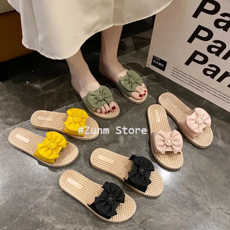Dép nữ giả cói đính nơ đế nhựa dẻo đi biển mùa hè - Zunm Store
