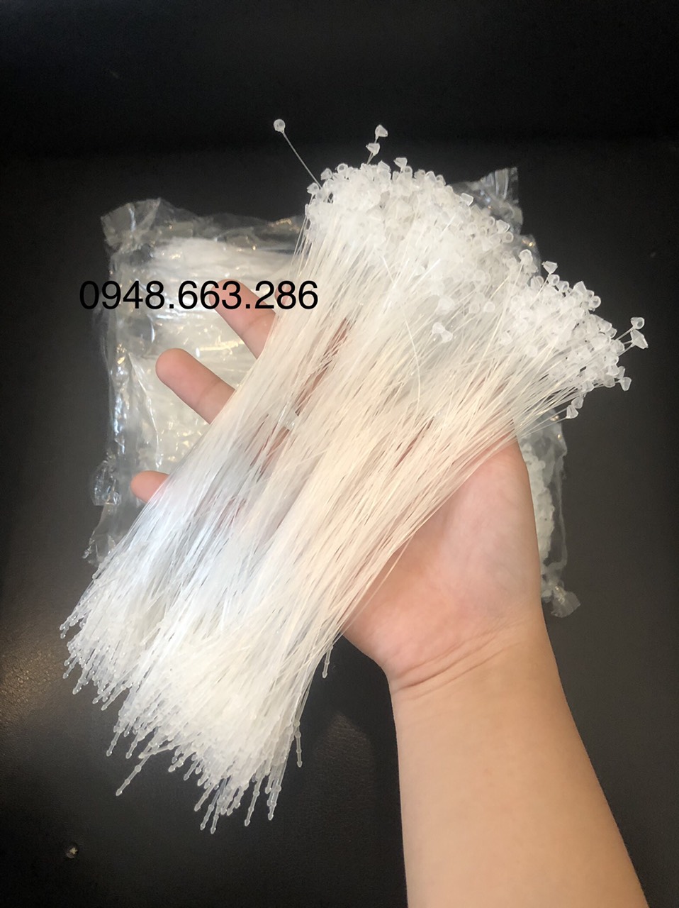 Dây nhựa dắn mác-dây cước gắn mác quần áo-1 túi có 1000 cái dây nhựa