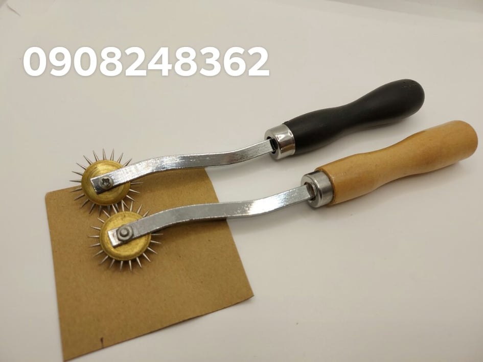 Cây lăn lấy dấu lấy dấu trên rập vật liệu .