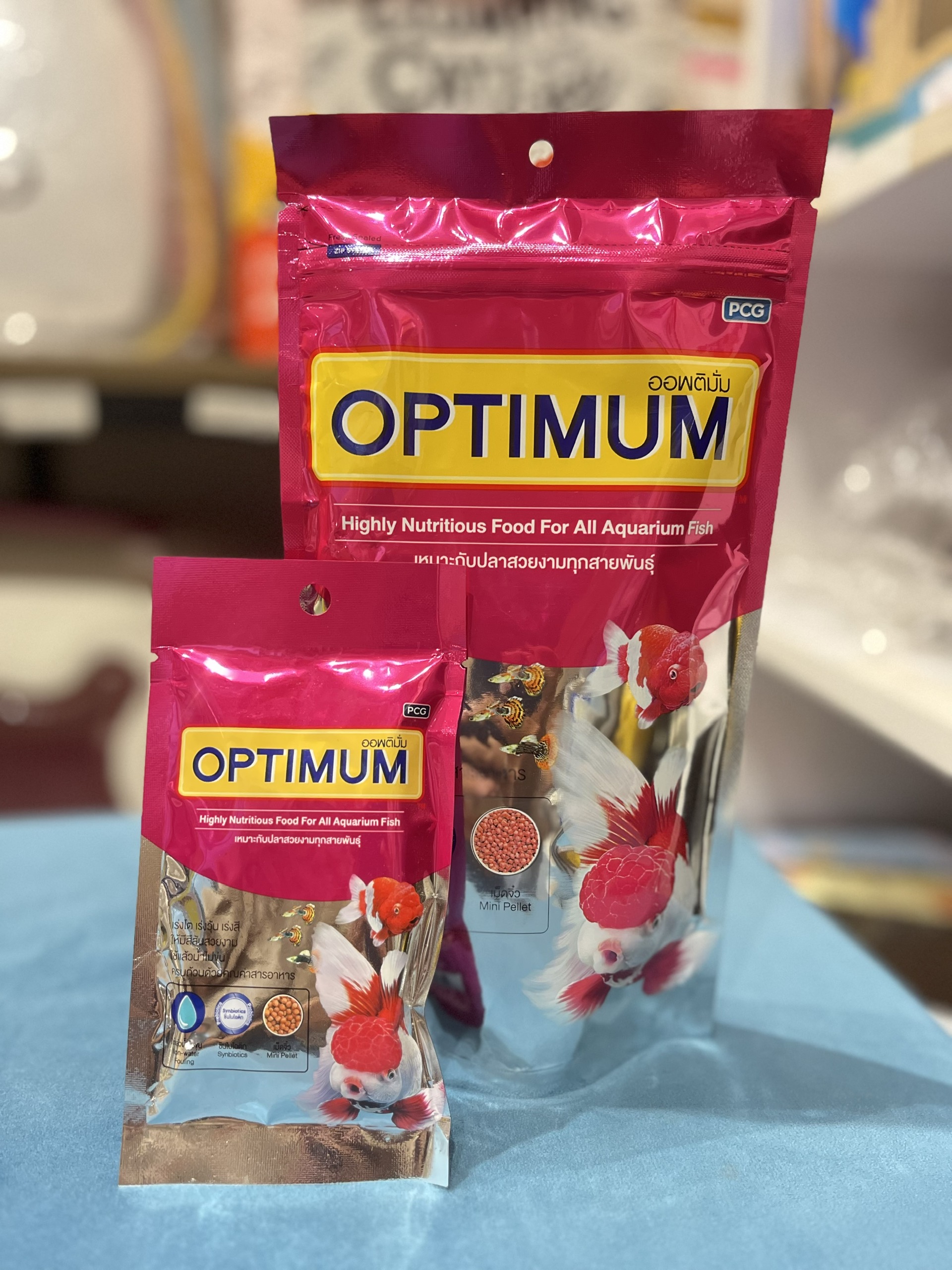 Thức ăn cho cá cảnh- optimum - -cho cá vàng,cá cảnh, cá kiếm, ông tiên, betta