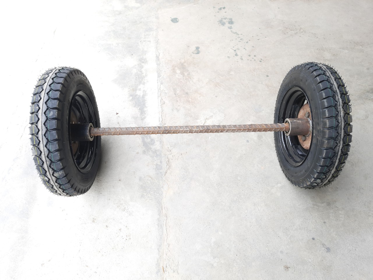 Bộ trục và bánh xe lôi lắp bánh 500-12