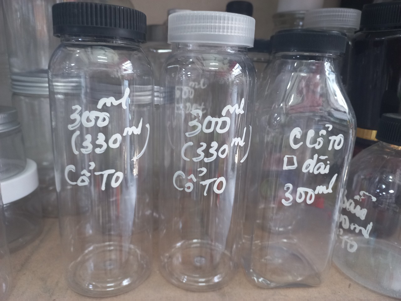 Chai nhựa pet 300ml cổ to đựng trà sữa , chè dưỡng nhan ...
