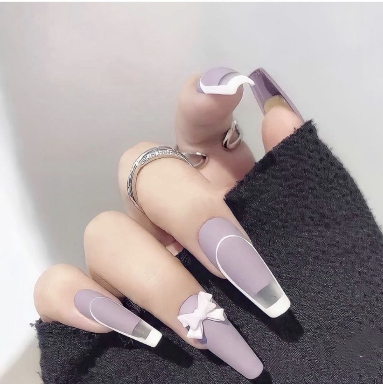 Nailbox tím pastel lì gắn nơ tiểu thơ