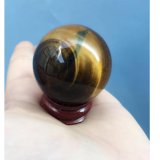 Quả cầu đá mắt hổ đen ánh vàng 3cm