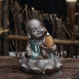 Thác Khói Trầm Hương cậu bé thần tài
