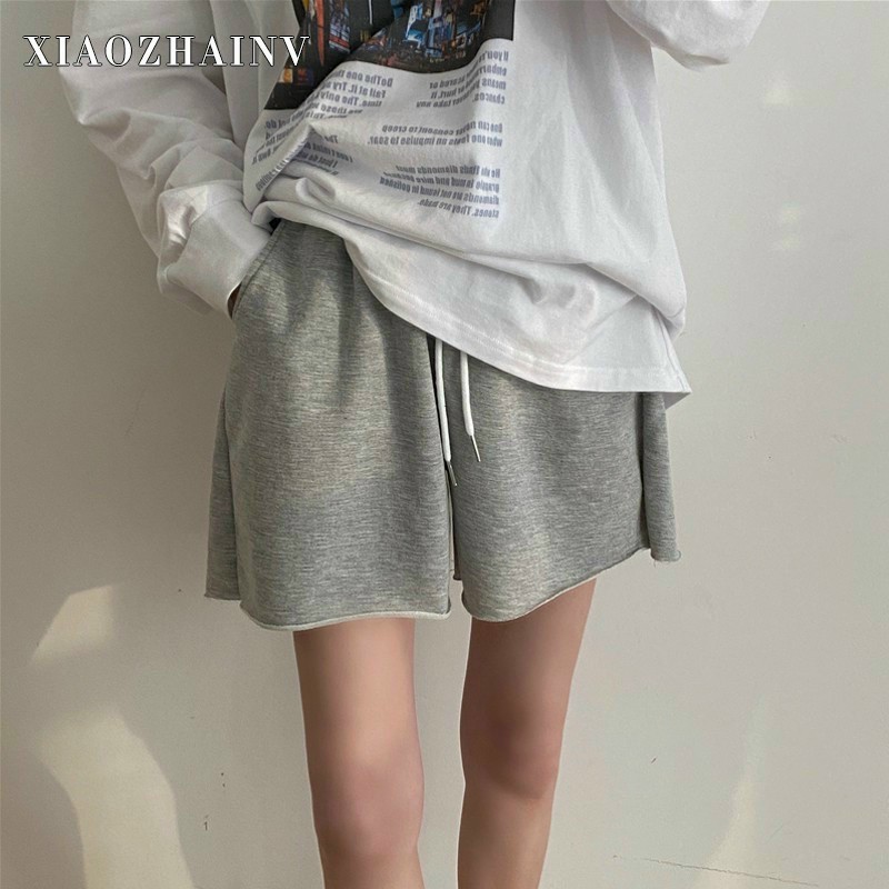 Quần short nỉ da cá , ống rộng,lưng thun quần sooc trơn nam nữ phong cách Hàn Quốc