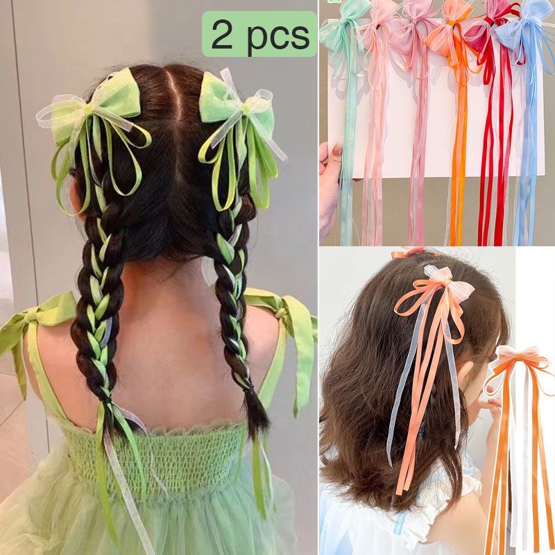 Set 2 kẹp tóc nơ tua rua đan tết dành cho bé gái PK160