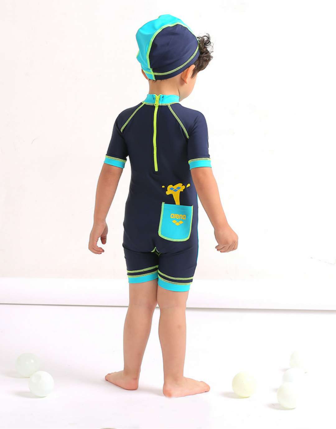 Đồ bơi bé trai liền thân họa tiết cá heo - kèm nón