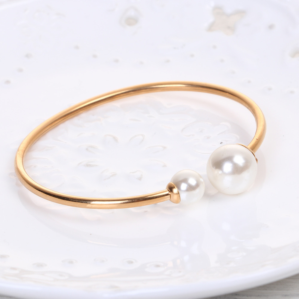 [HCM]Vòng tay titan vàng cao cấp đính 2 viên ngọc trai thật