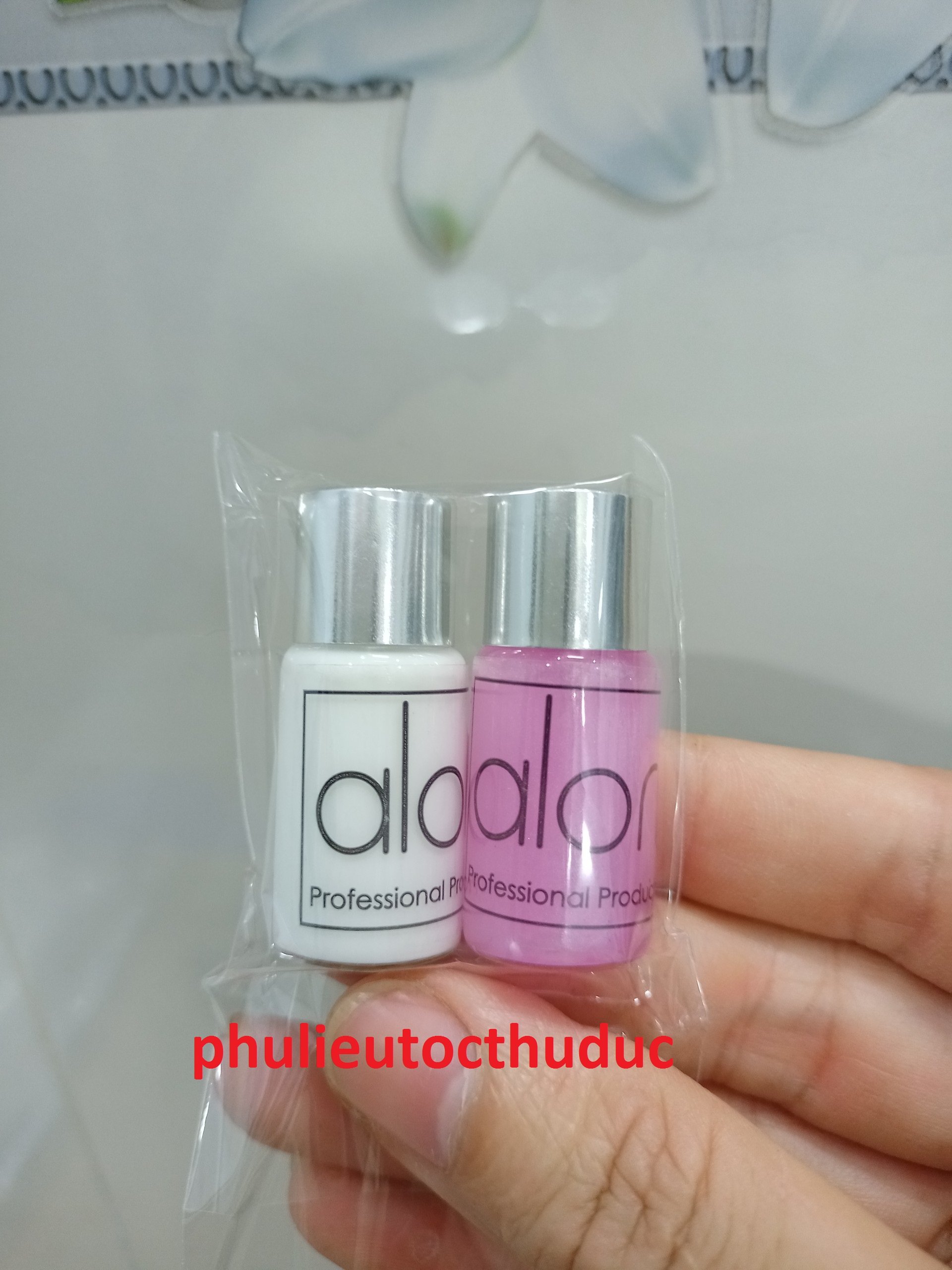 1 cặp dung dịch uốn mi gồm có dung dịch uốn và dung dịch dập