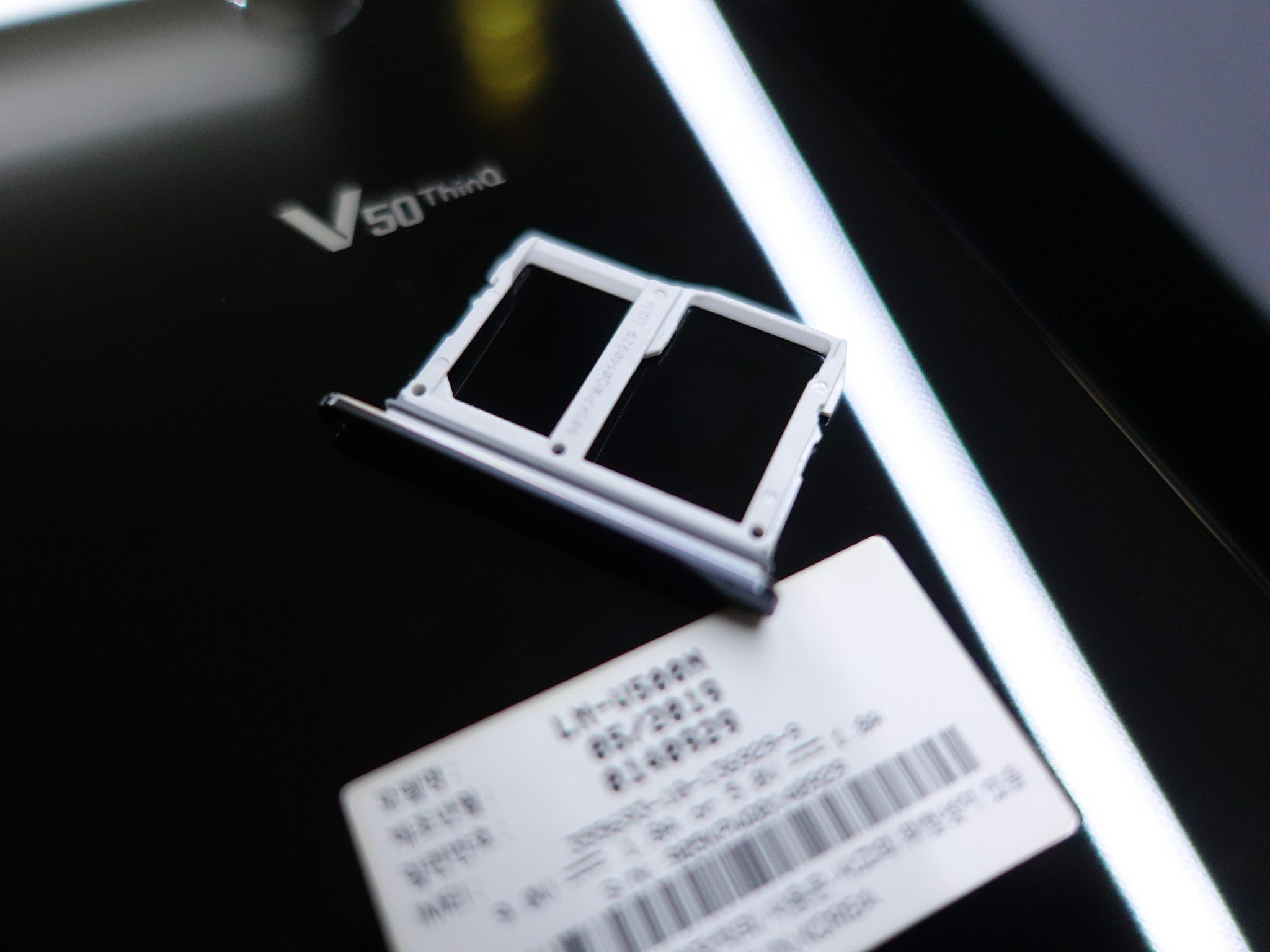 Khay sim điện thoại lg v50 thinq