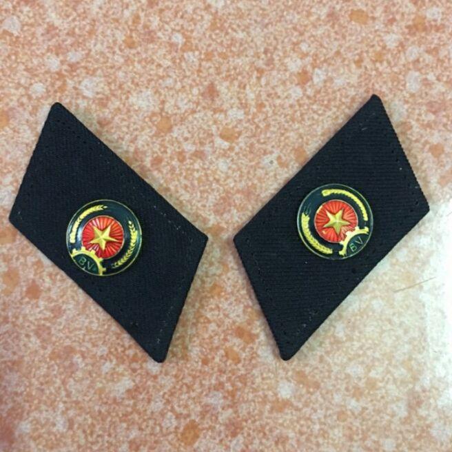 Trang phục bảo vệ- ve tiết cổ áo