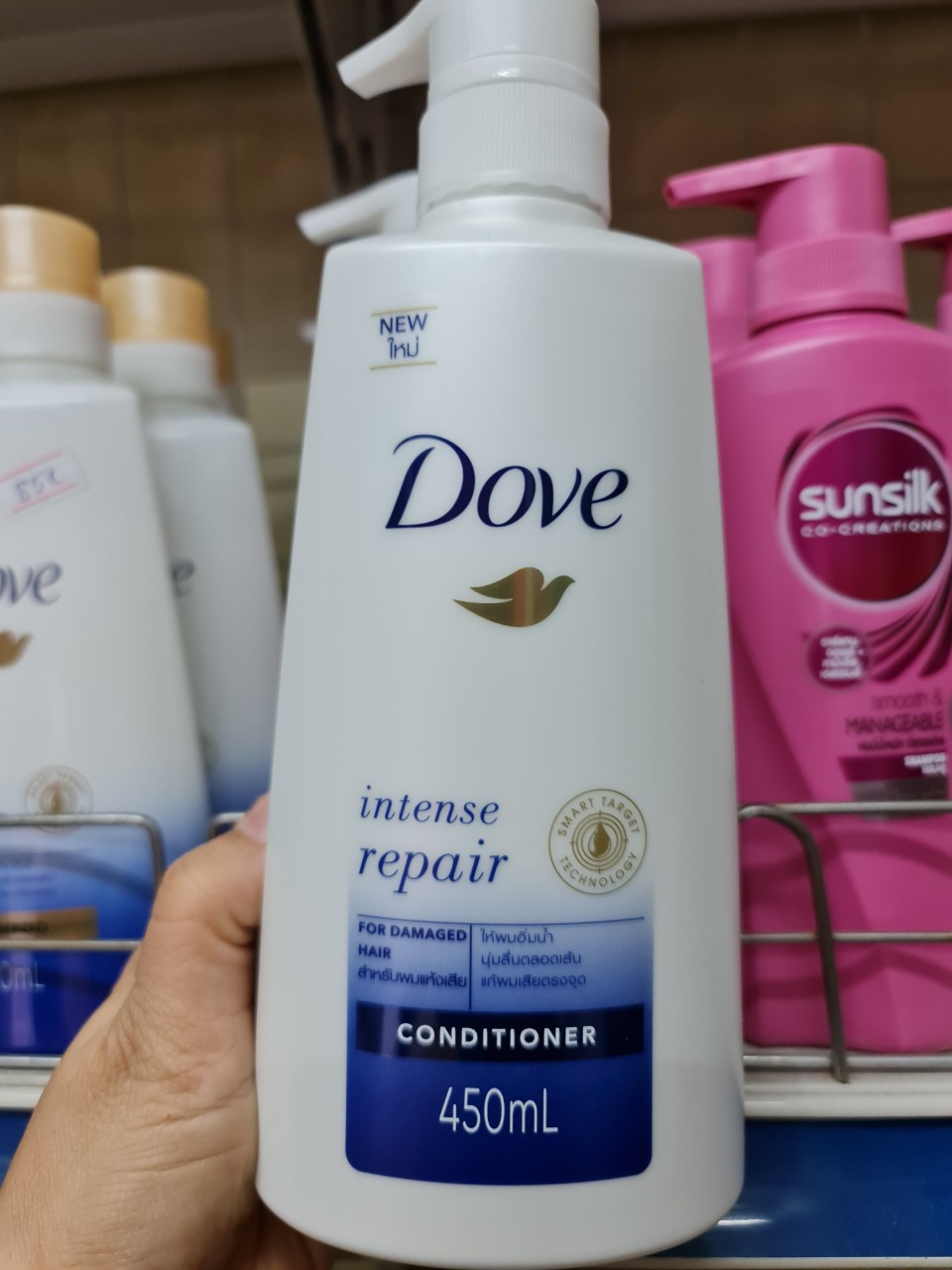 Dầu xả Dove phục hồi hư tổn 450ml của Thái Lan