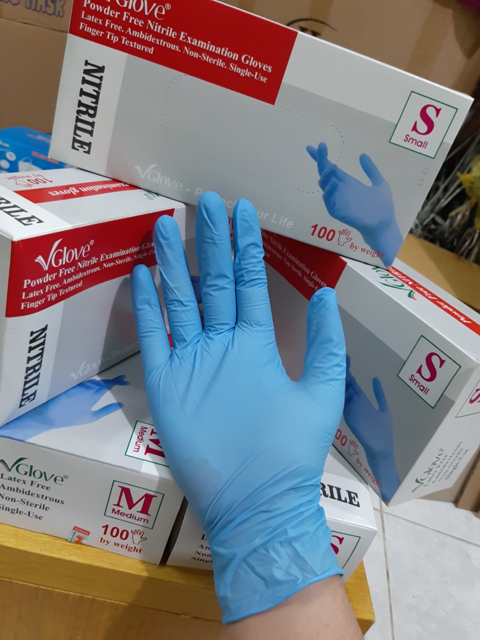 CHÍNH HÃNG KHẢI HOÀN (1 Hộp 100 chiếc -50 ĐÔI) Găng tay nitrile không bột 4.0 -Găng tay y tế Nitrile Vglove màu xanh-HÀNG SẴN-Hộp 100 chiếc Size S M L