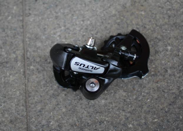 Đề sau shimano altus m310 7/8sp