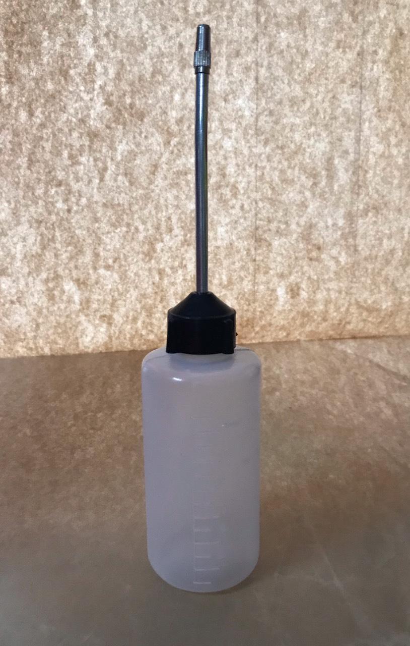 Bình đựng dầu máy may có van đóng mở