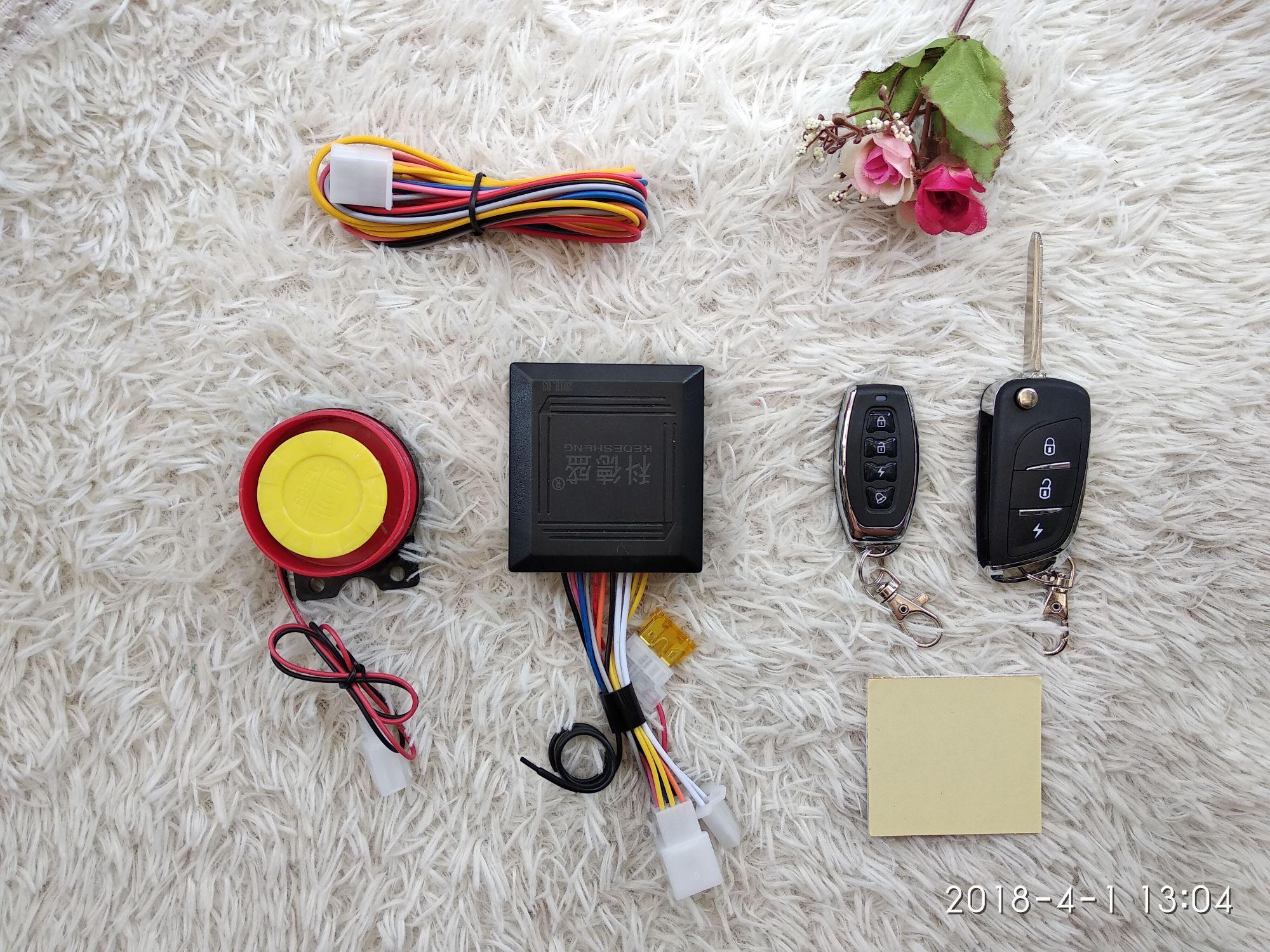 Khóa chống trộm xe máy 1 remote viền thép, 1 chìa khóa bật liền remote TA-14