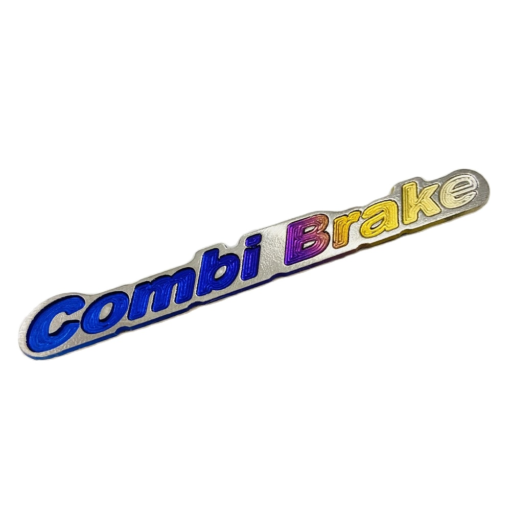 [HCM]Logo titan chữ  COMBI BRAKE dài dán mặt nạ ốp đầu phuộc trang trí xe máy ( có sẳn keo 3mm )