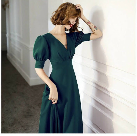 Đầm xoè xanh lai cách điệu cổ v