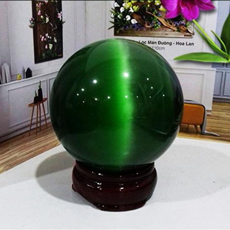 Quả cầu phong thủy đá mắt mèo xanh lá đường kính 6cm- tặng kèm chân đế