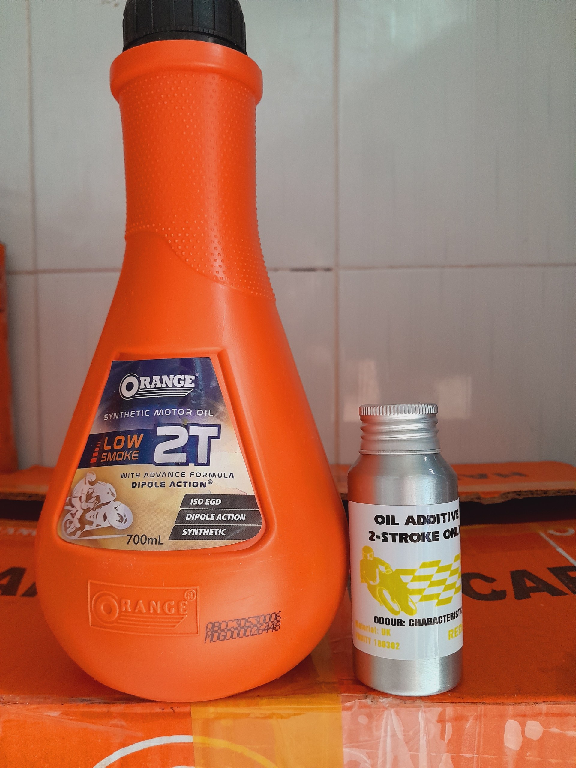 Nhớt thơm 2 thì orange 700ml và phụ gia 55ml cao cấp cho xe xipo mùi dâu tây, singum, bò cụng