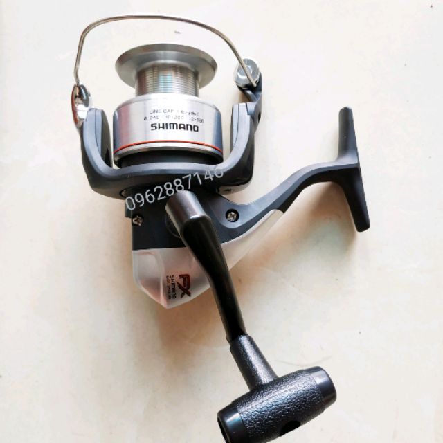 Máy câu cá shimano fx4000 loại 1 malaisia   ( xả kho )