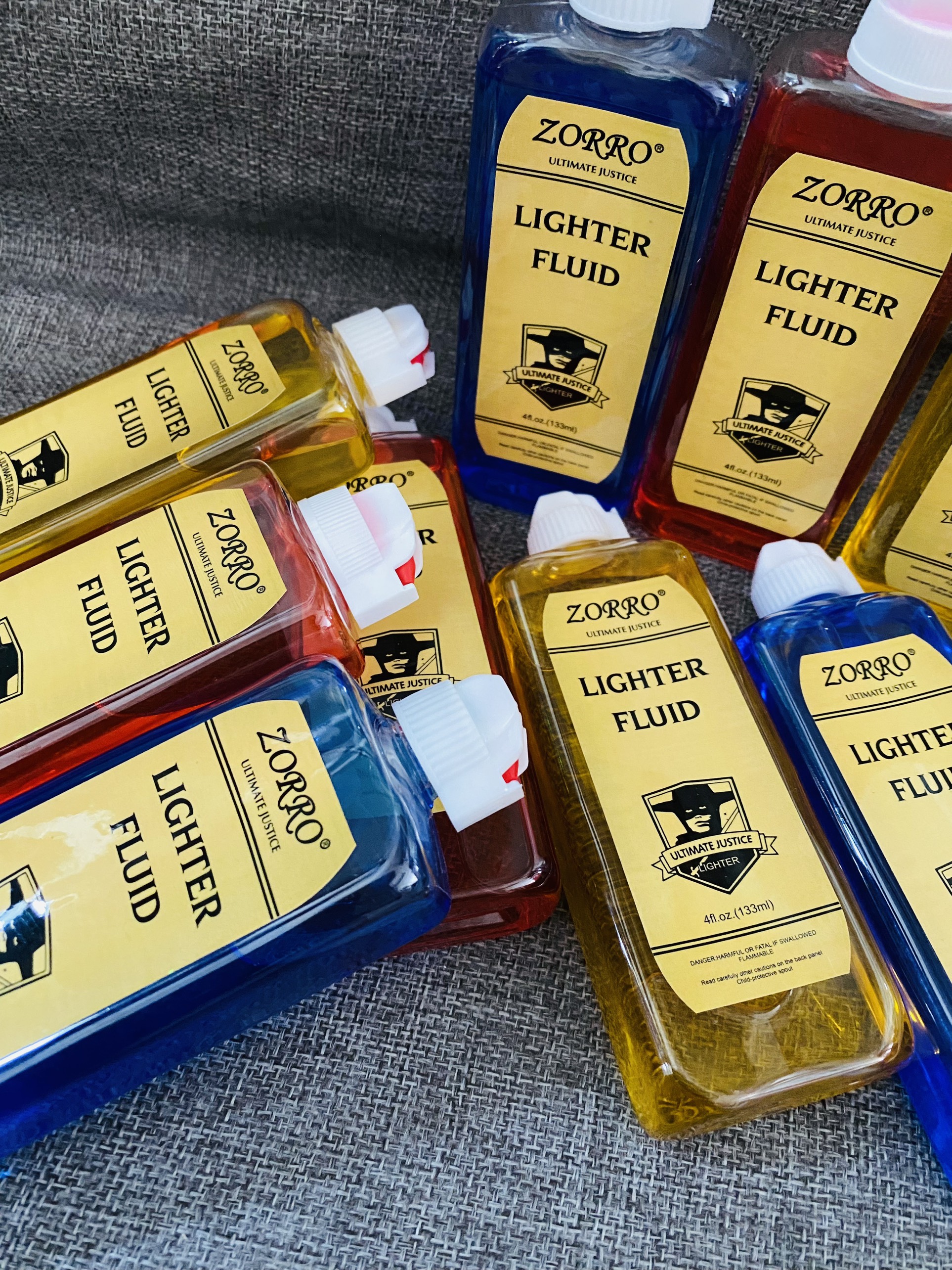 Chai Xăng Zorro chính Hãng Dùng Cho Bật Lửa Hàng Cao Cấp 133ml Màu Đỏ Xanh Vàng .