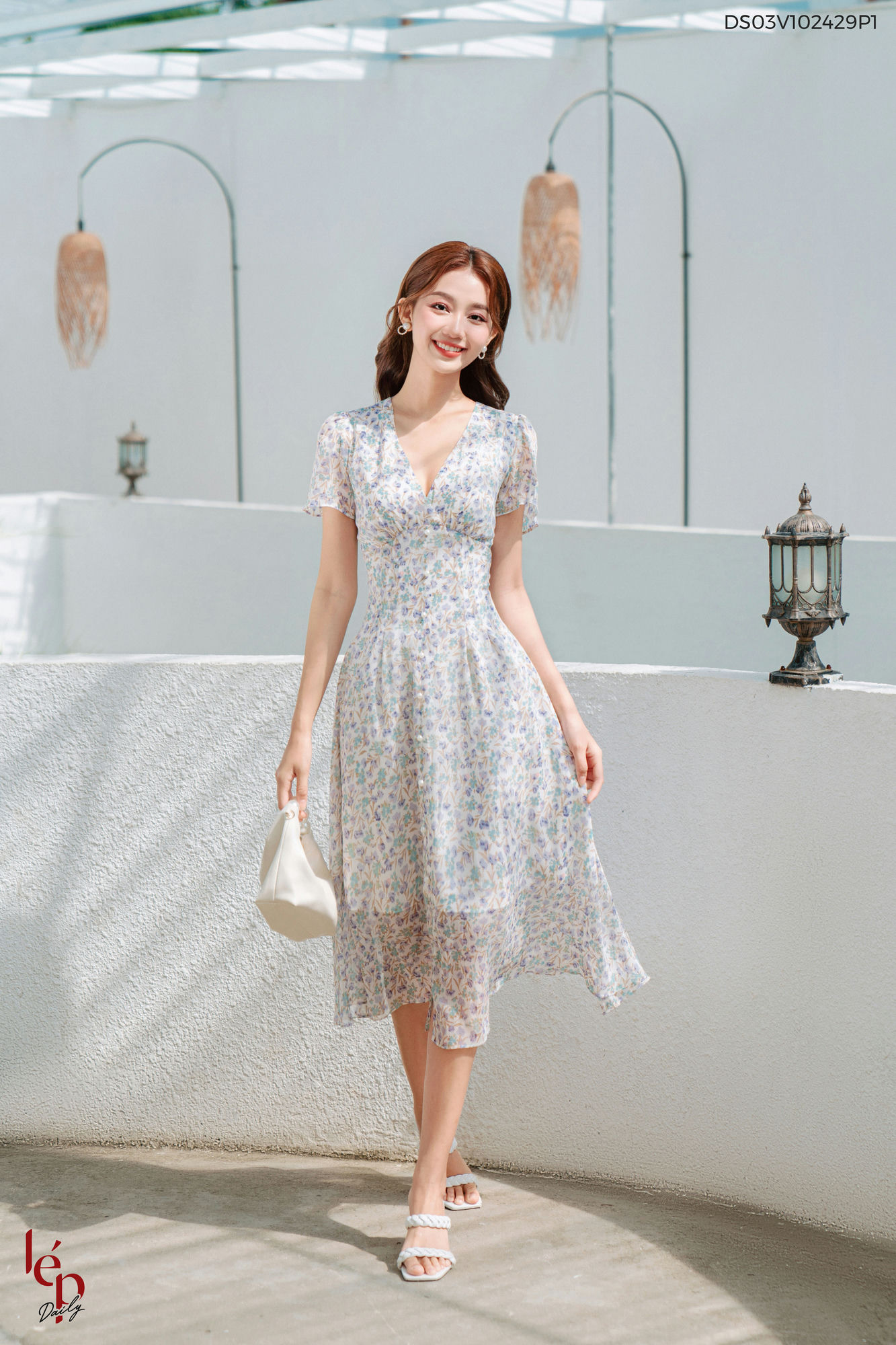 Váy hoa nhí tím cổ v 1 hàng cúc dáng xòe mini lep' ds03v102429p1